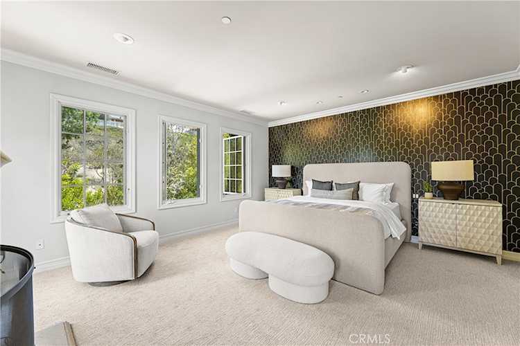 Primary suite with fireplace and retreat