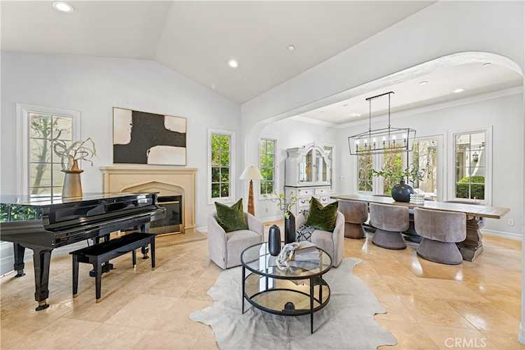 Formal living room opening to the atrium